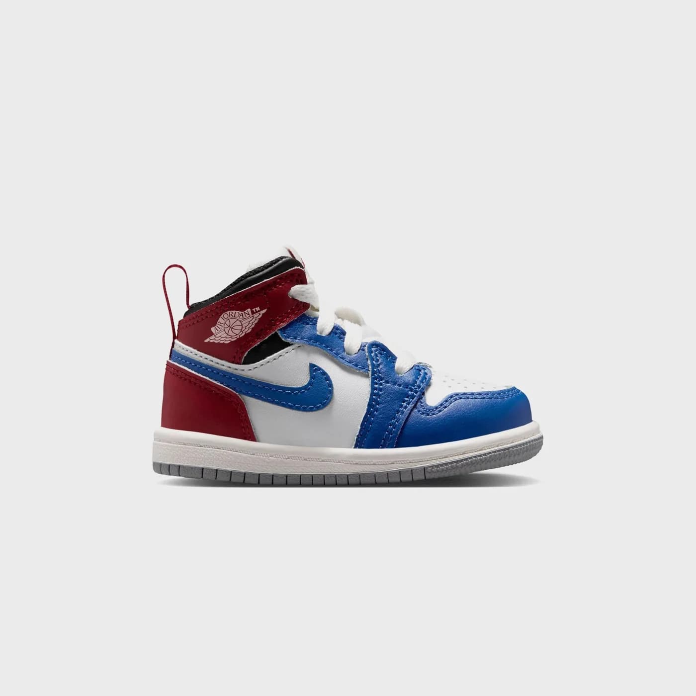 Jordan TD Jordan 1 Mid - True Blue / Varsity Red / Black / Summit White release photo 1