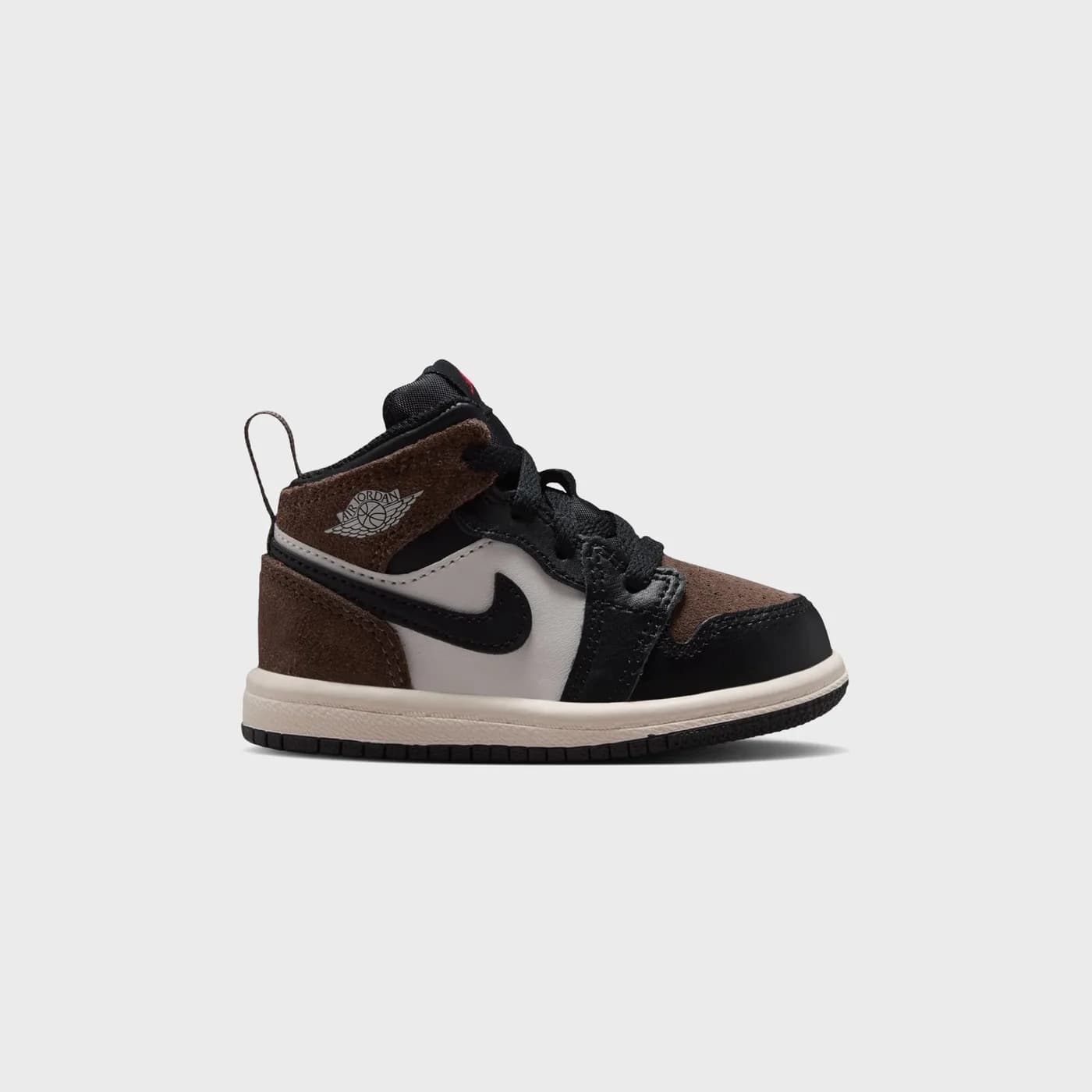 Jordan TD Jordan 1 Mid - Black / Palomino / University Red / Phantom release photo 1